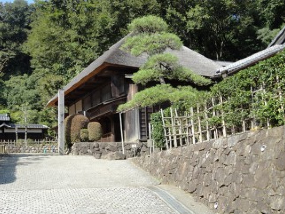 Proceeding along the walkway, the first of the old style traditional village houses comes into view.